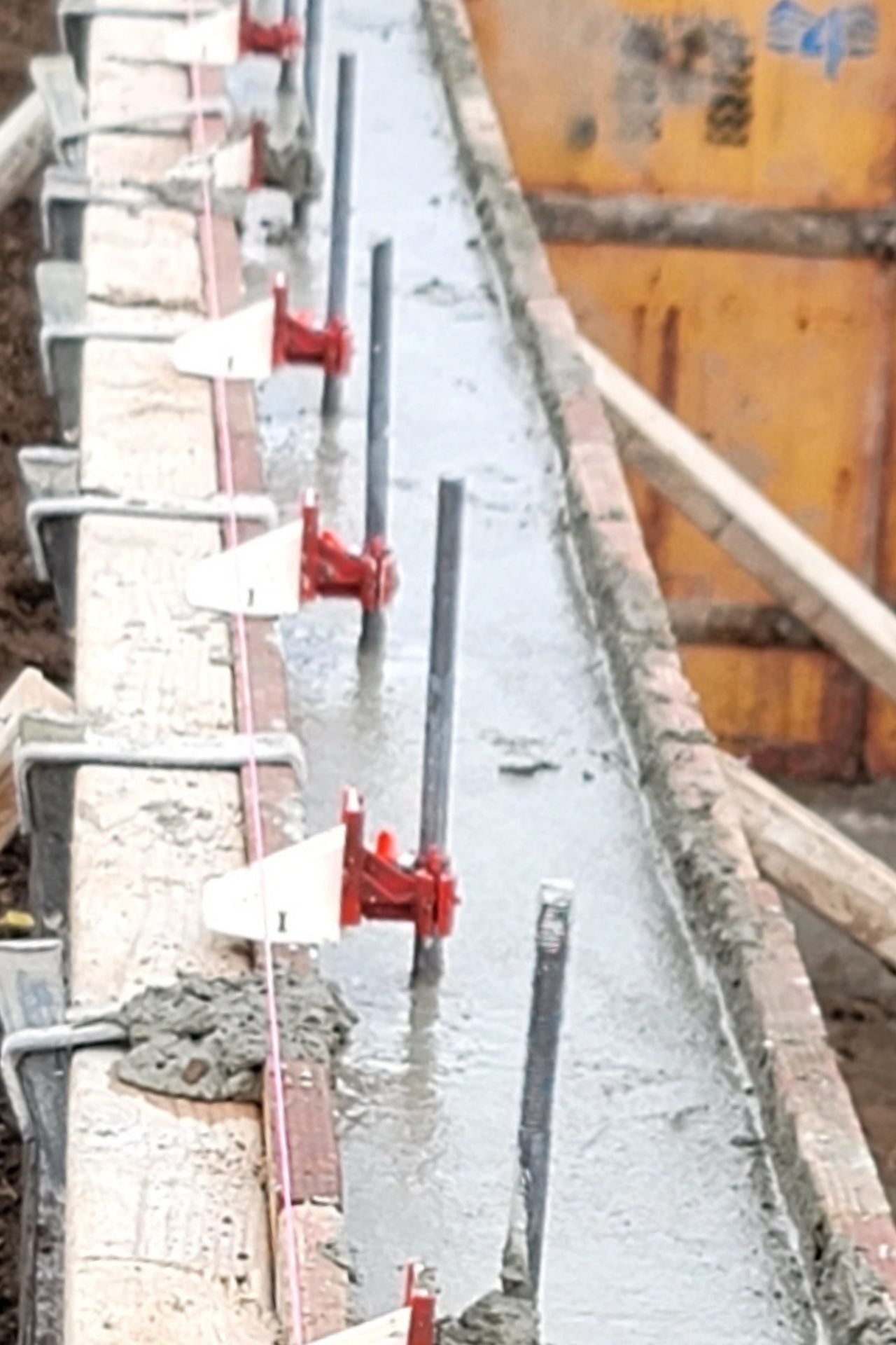 Abby Brackets installed along wet concrete form